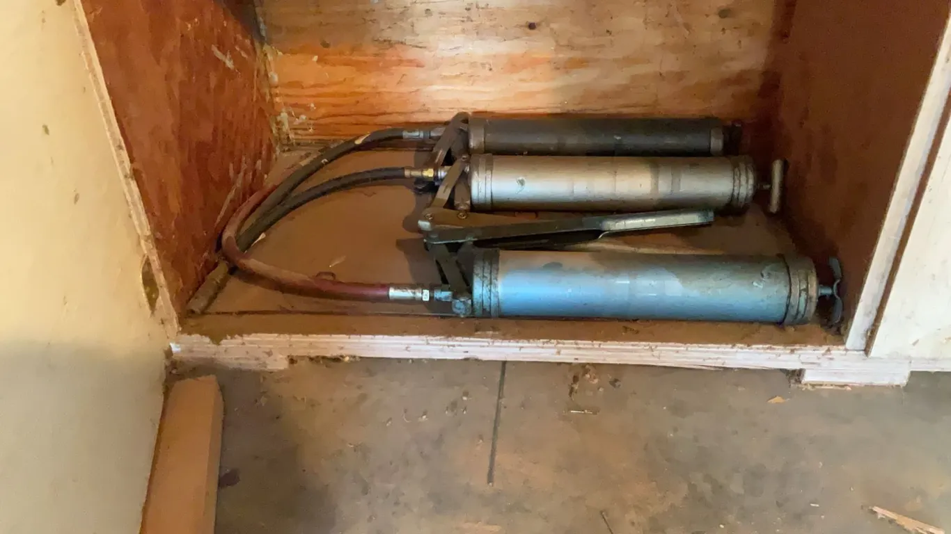 Three Metal Grease Guns with Hoses