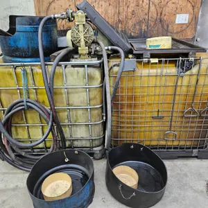 2 Bulk Fluid Transfer Totes with Diaphragm Pump & Hoses (for Used Oil)