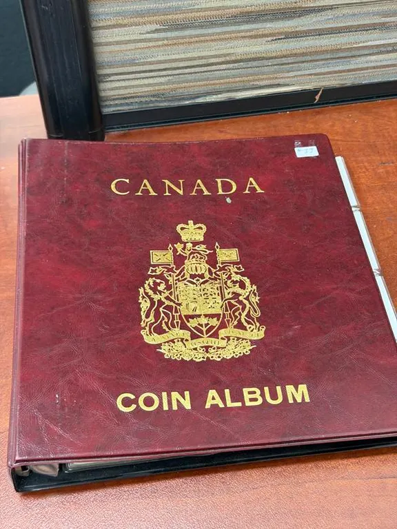 Coin Album with Cdn 1 cent and 5 cent