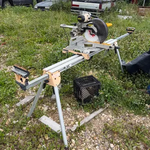 Dewalt 12” Mitre Saw and Stand *See Pictures **This item SOLD LIVE ON-SITE ONLY!!