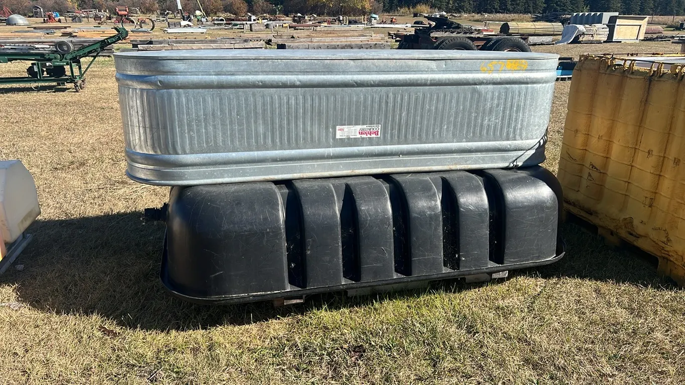 (1) Poly Approx 200 Gallon 1 Steel Approx 125 Gallon Livestock Waterers