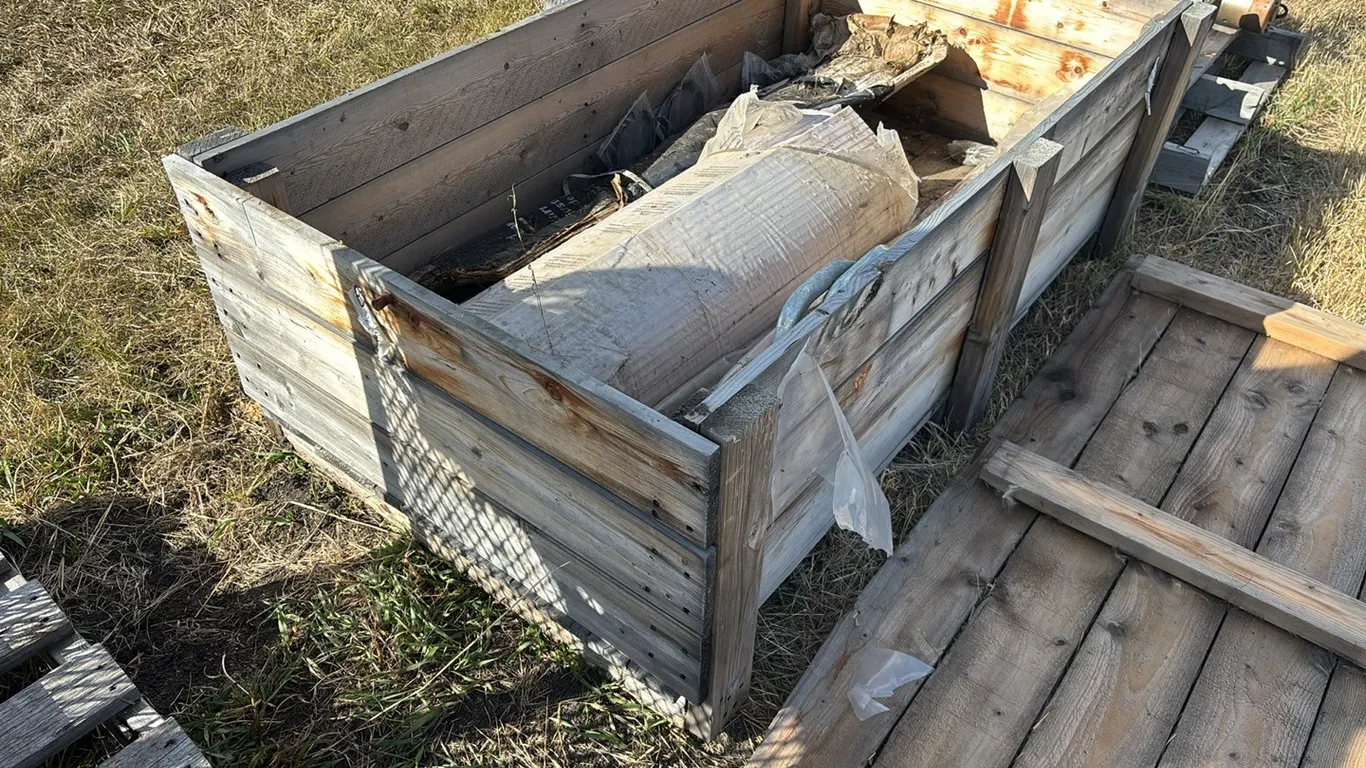Crate of Vinyl Covered Chainlink Fence with Roll of Corregated Barrier Fence