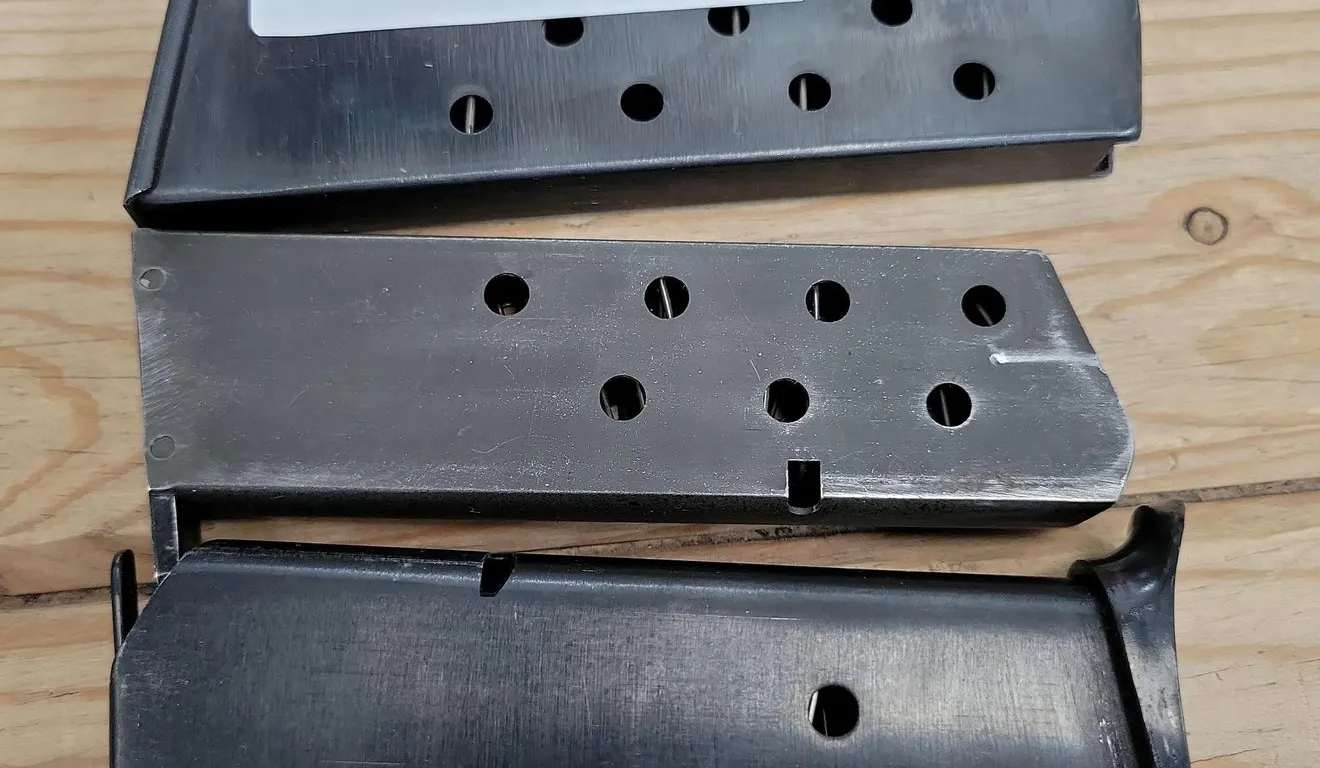 (1) ZASTAVA M57 (2) TOKAREV PISTOL MAGAZINES