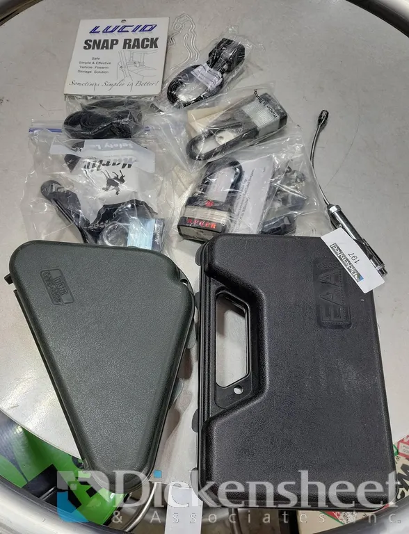 (2) PLASTIC PISTOL CASES AND TRIGGER LOCKS