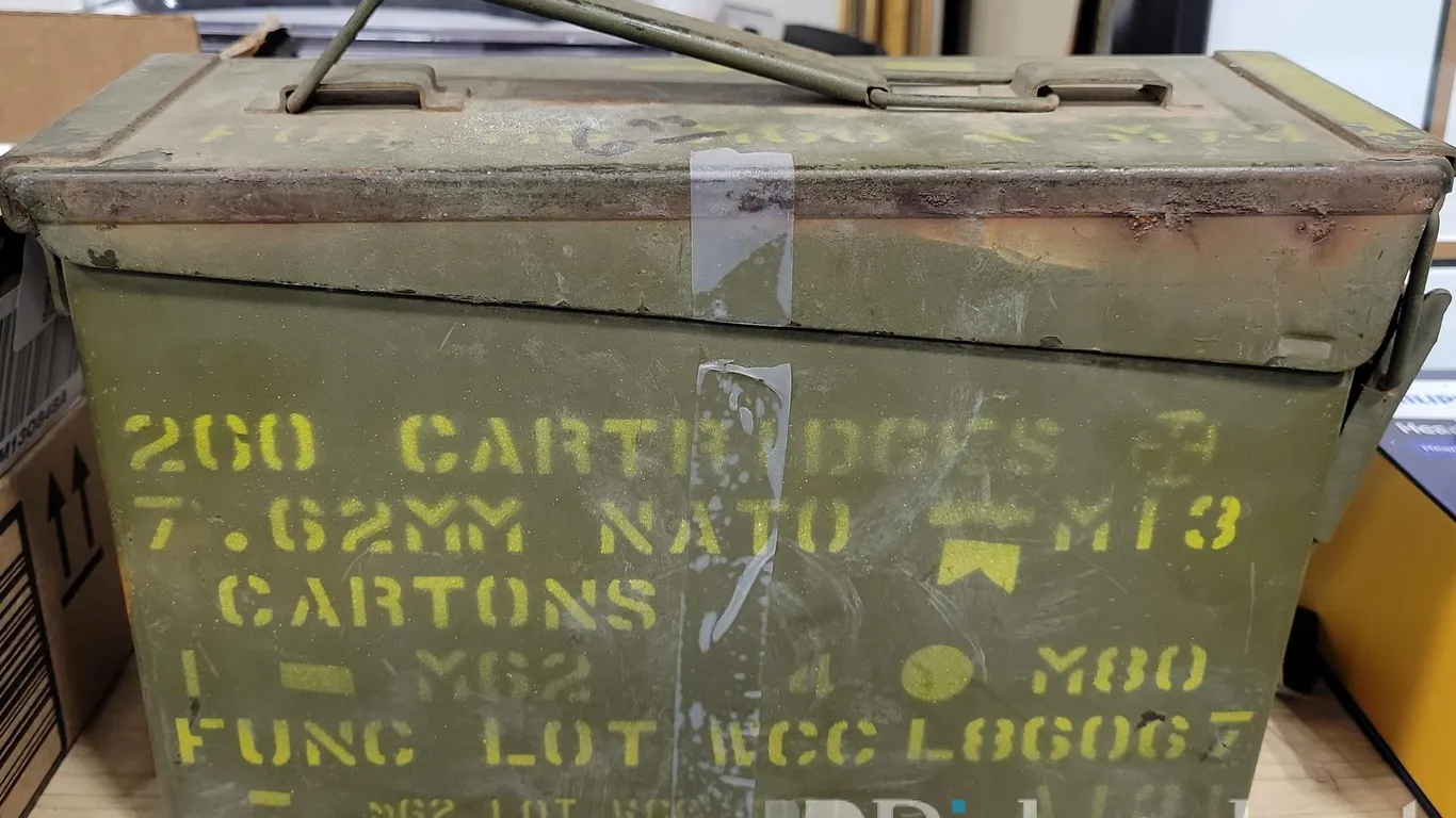 AMMO BOX WITH (3) FULL BOXES .22 LR AMMUNITION & (1) RUGER 9MM 7 RD MAGAZINE