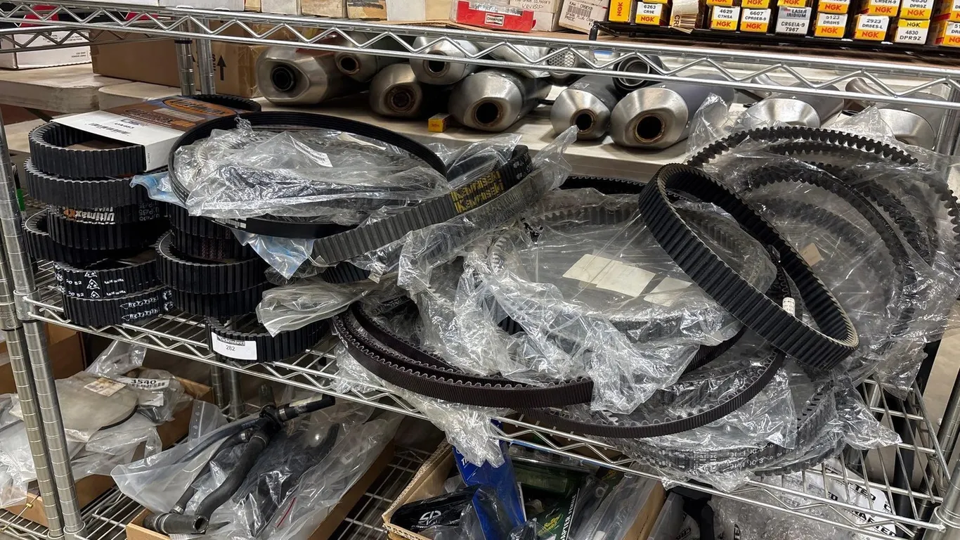 LARGE LOT OF KAWASAKI AND TIMKEN DRIVE BELTS