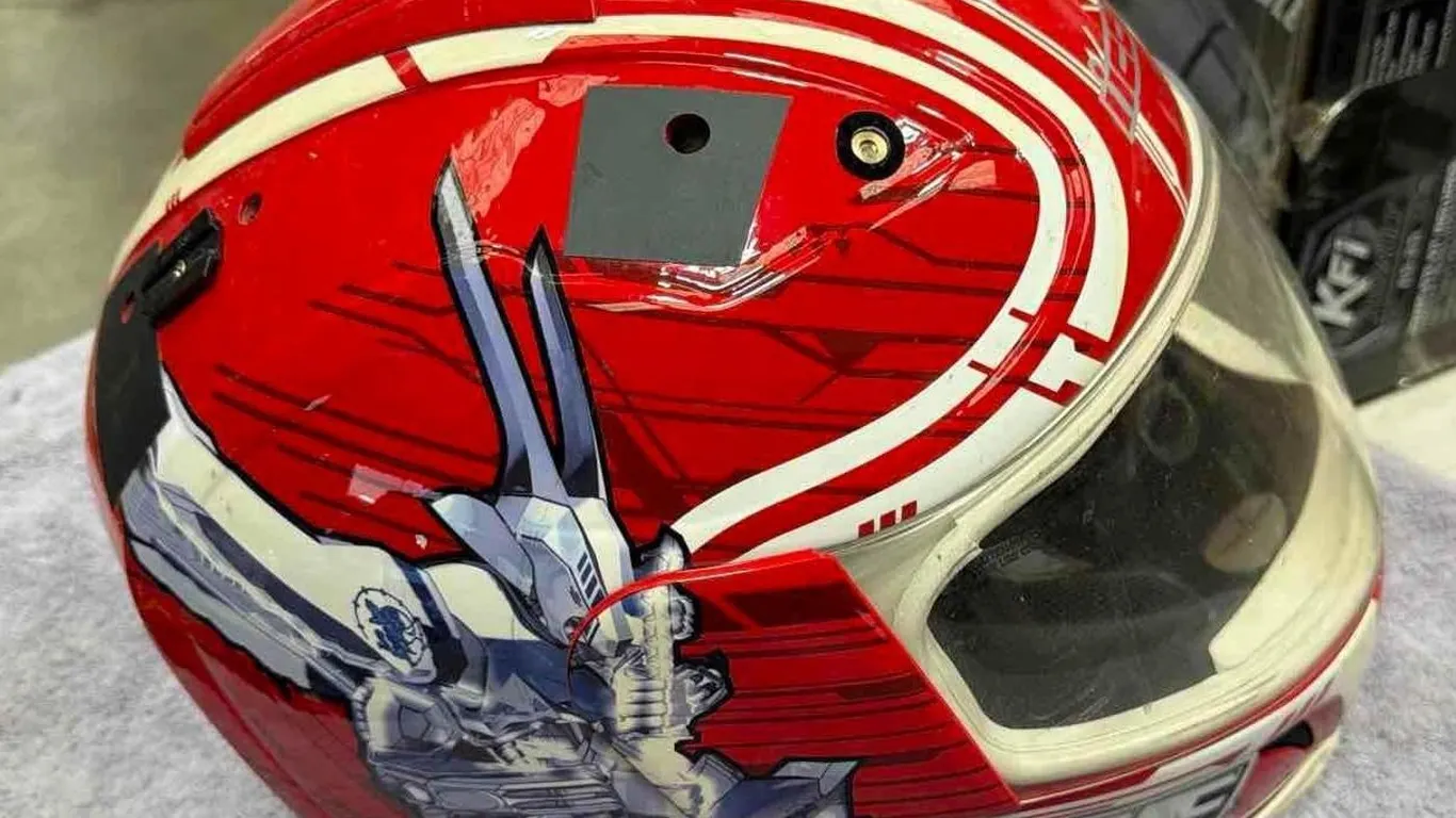 RED AN WHITE FULL FACE M HELMET, PREOWNED WITH CUSTOM STICKERS
