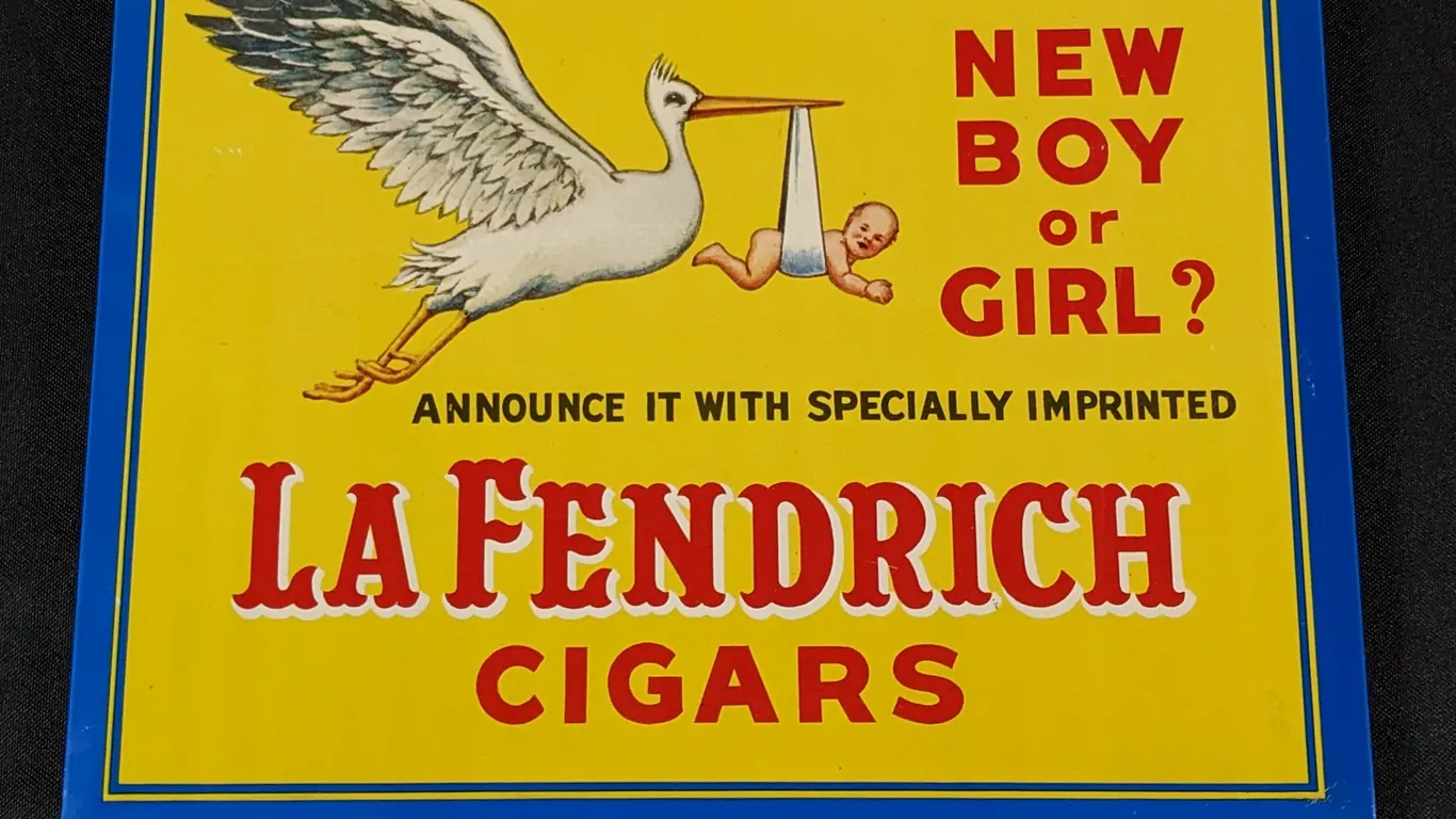 NOS TOC TIN SIGN NEW BOY OR GIRL? ANNOUNCE IT WITH SPECIALLY IMPRINTED LA FENDRICH CIGARS