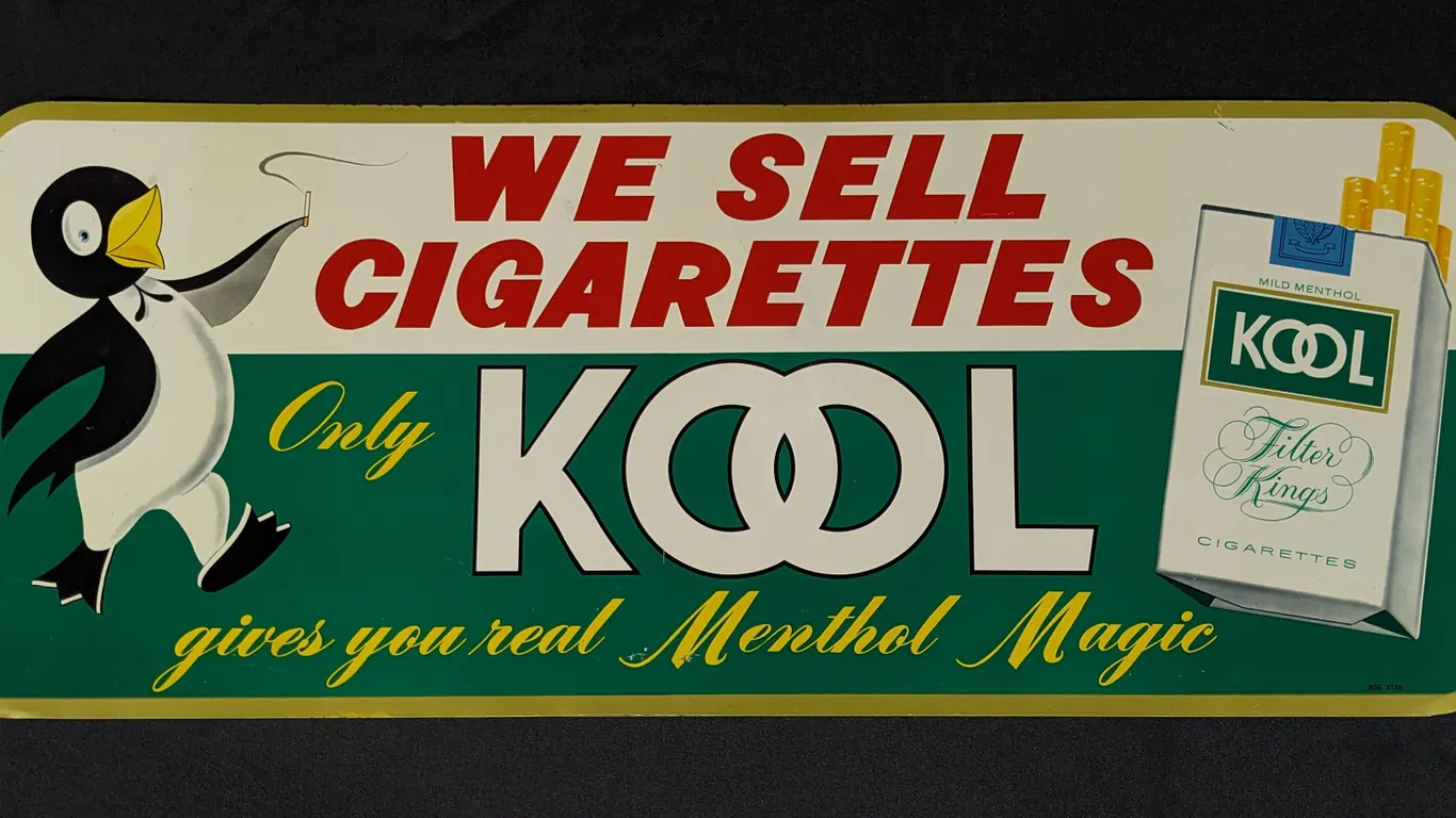 TIN SIGN WE SELL CIGARETTES ONLY KOOL GIVES YOU REAL MENTHOL MAGIC (PENGUIN)