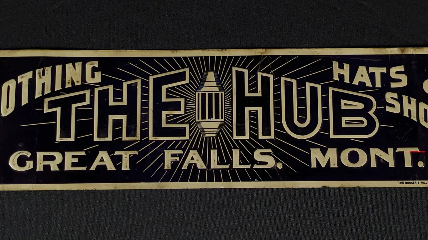 EMBOSSED TIN SIGN THE HUB GREAT FALLS MONTANA CLOTHING, HATS & SHOES