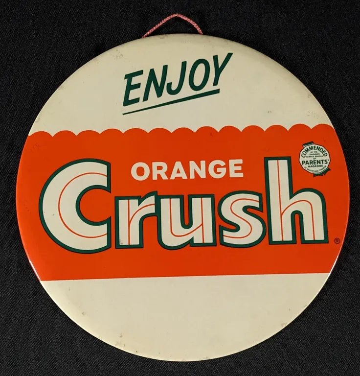 9" CELLULOID SIGN ENJOY ORANGE CRUSH
