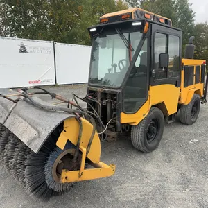 Trackless MT6 Sidewalk Machine with Sweeper