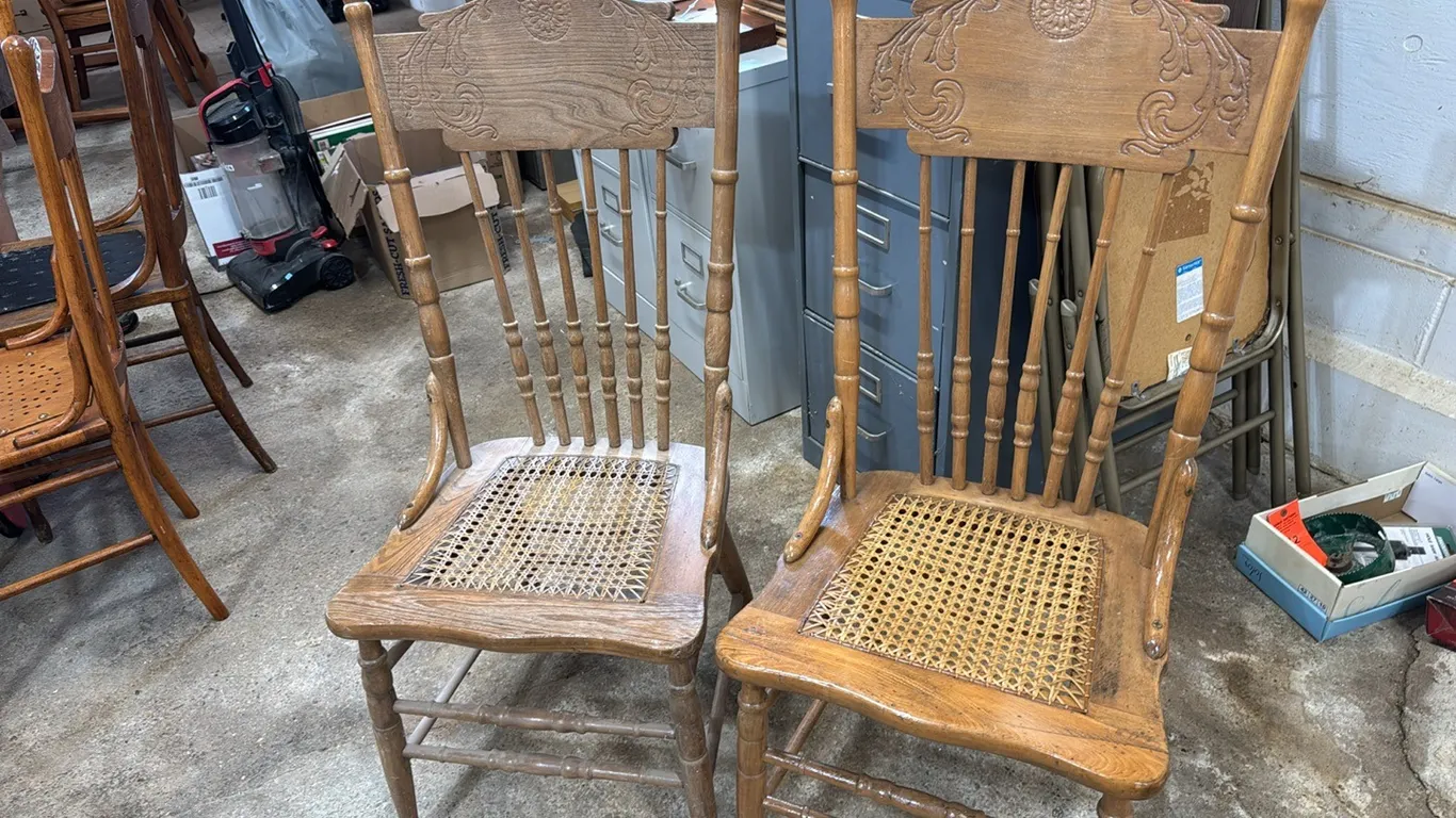 2 cane sear wood chairs