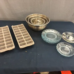 Mini plates, metal mixing bowls, and ice trays