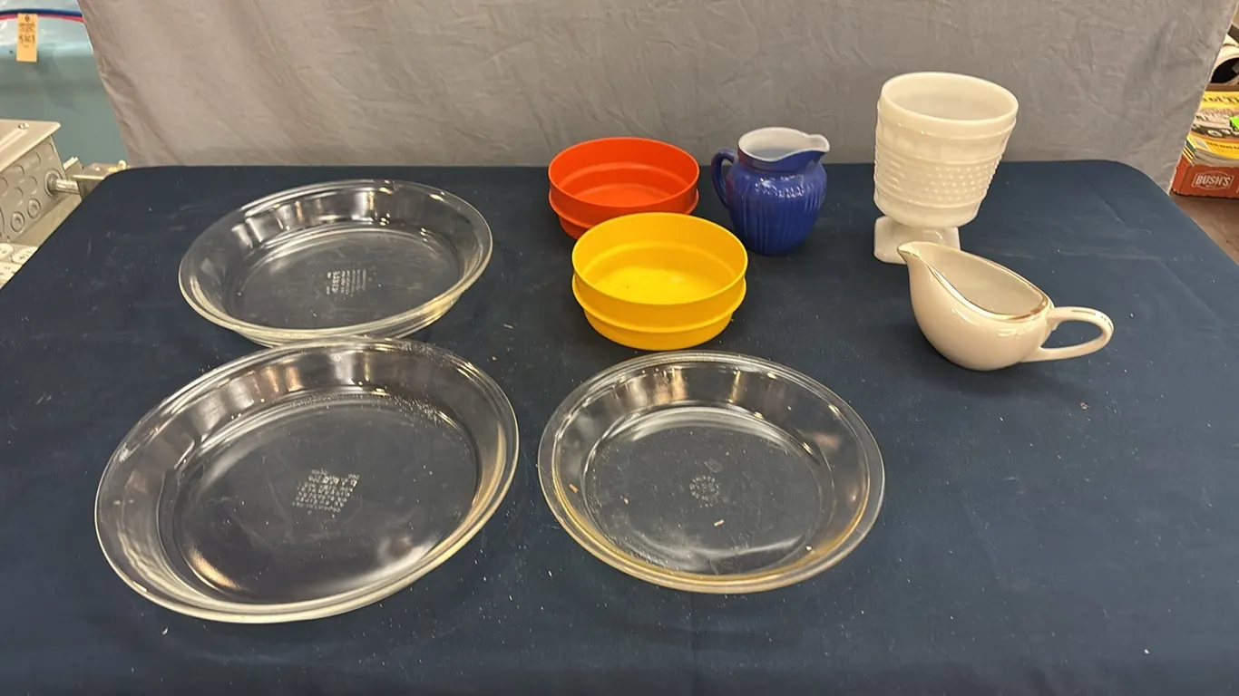 Pyrex plates, tupperware, and little pitchers