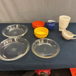 Pyrex plates, tupperware, and little pitchers
