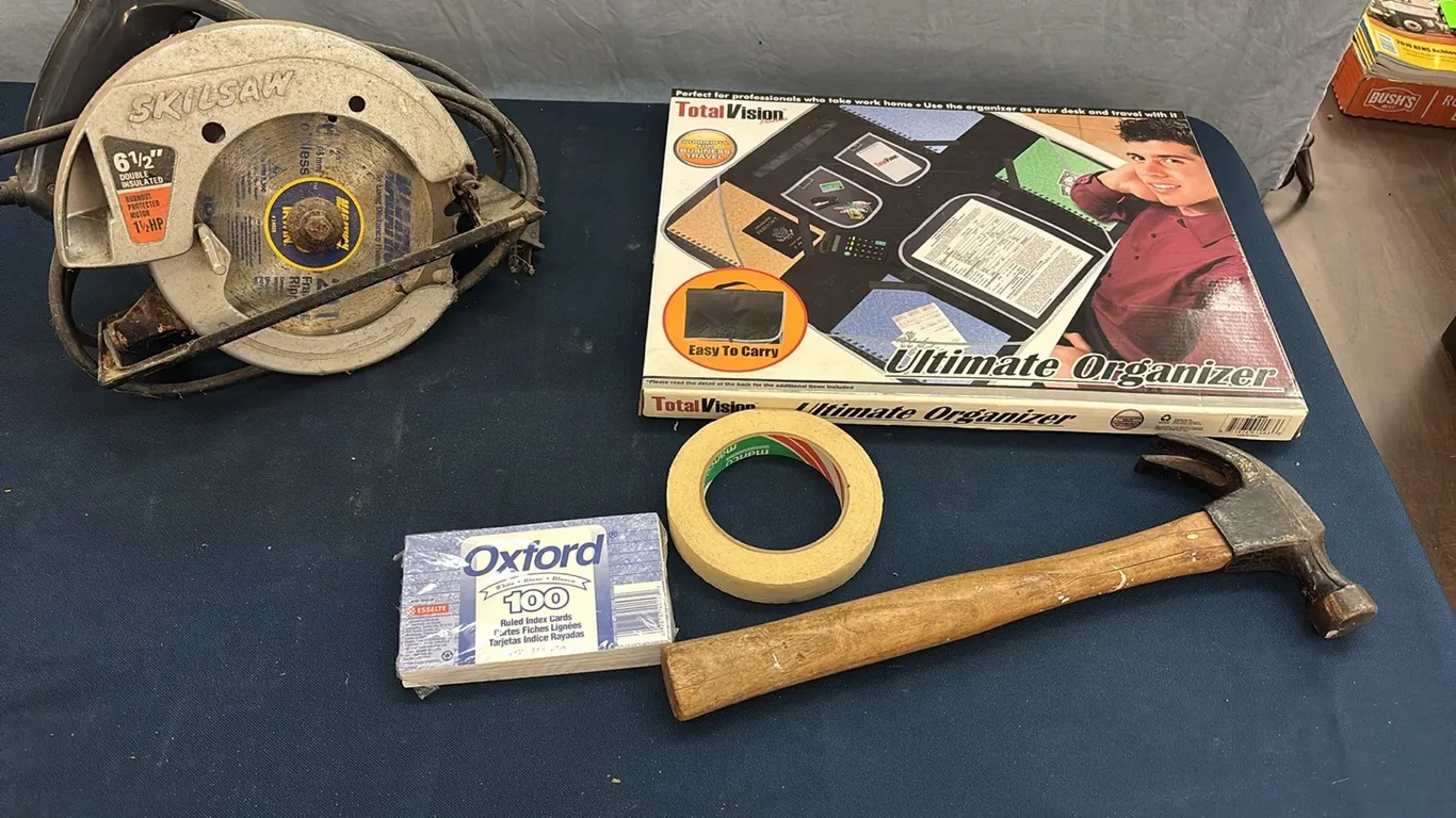 Organizer, circular saw, and hammer
