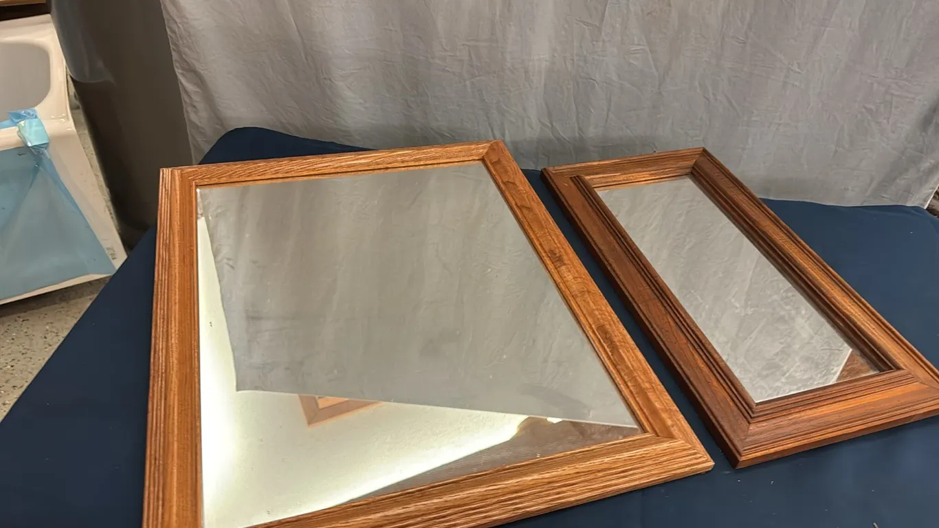 2 framed mirrors