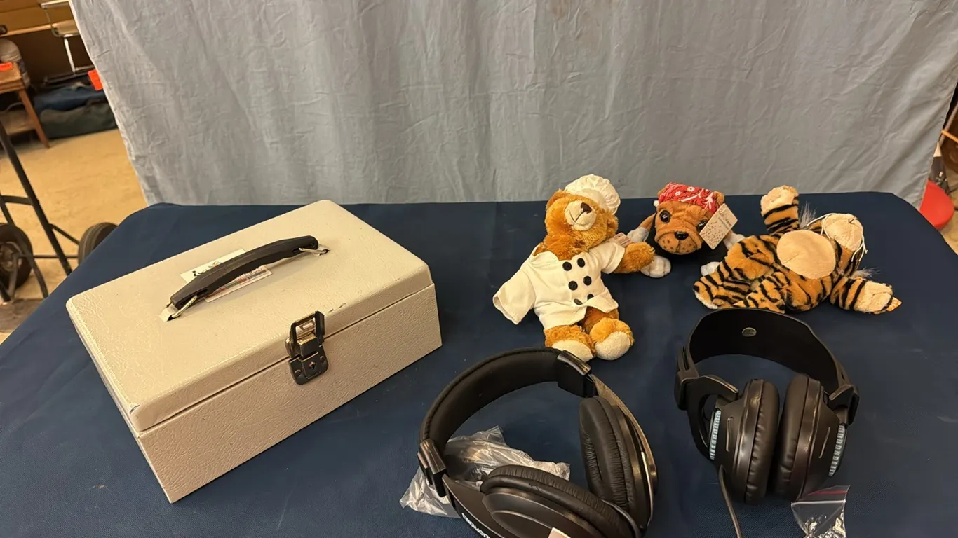 Cash box, headphones, stuffies
