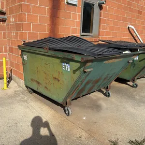 Green Commercial Dumpster (Left Dumpster)