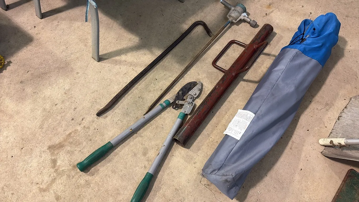 Post Pounder, Lawn Chair, Prybar & Sprinkler
