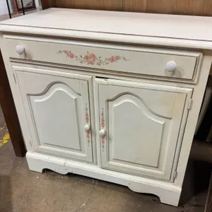 Painted Wooden Cabinet With Floral Accents and Two Doors