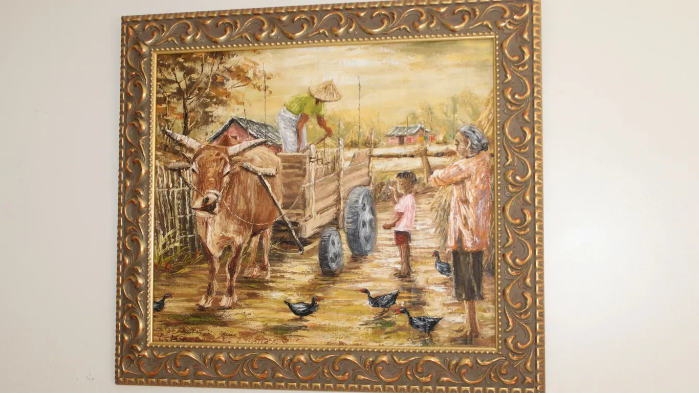 Framed Village Scene Artwork