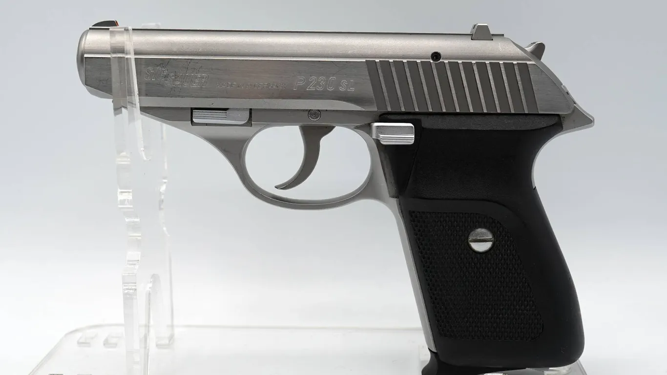 Sig Sauer - P230 SL 9mm Kurz Pistol w/ 2 Magazines