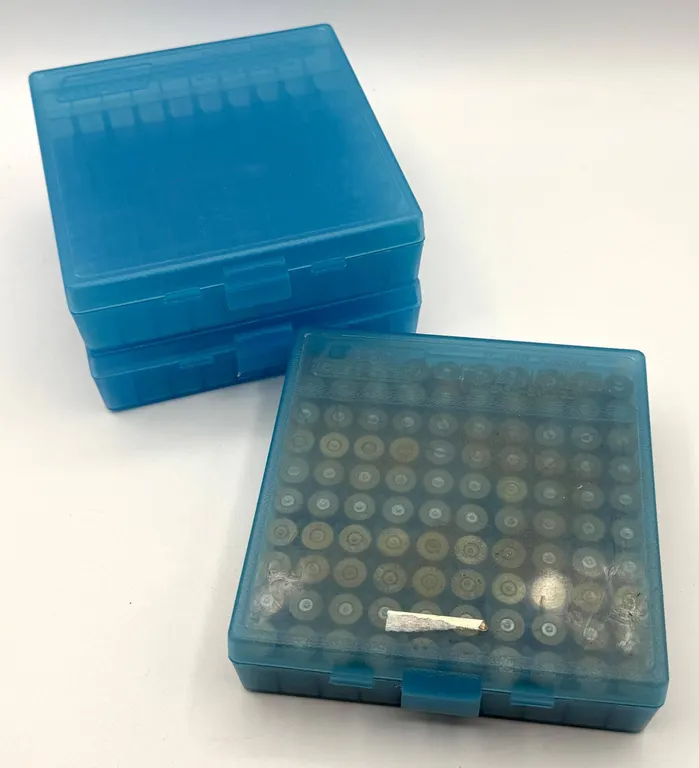 45 ACP Brass Casings in Storage Boxes