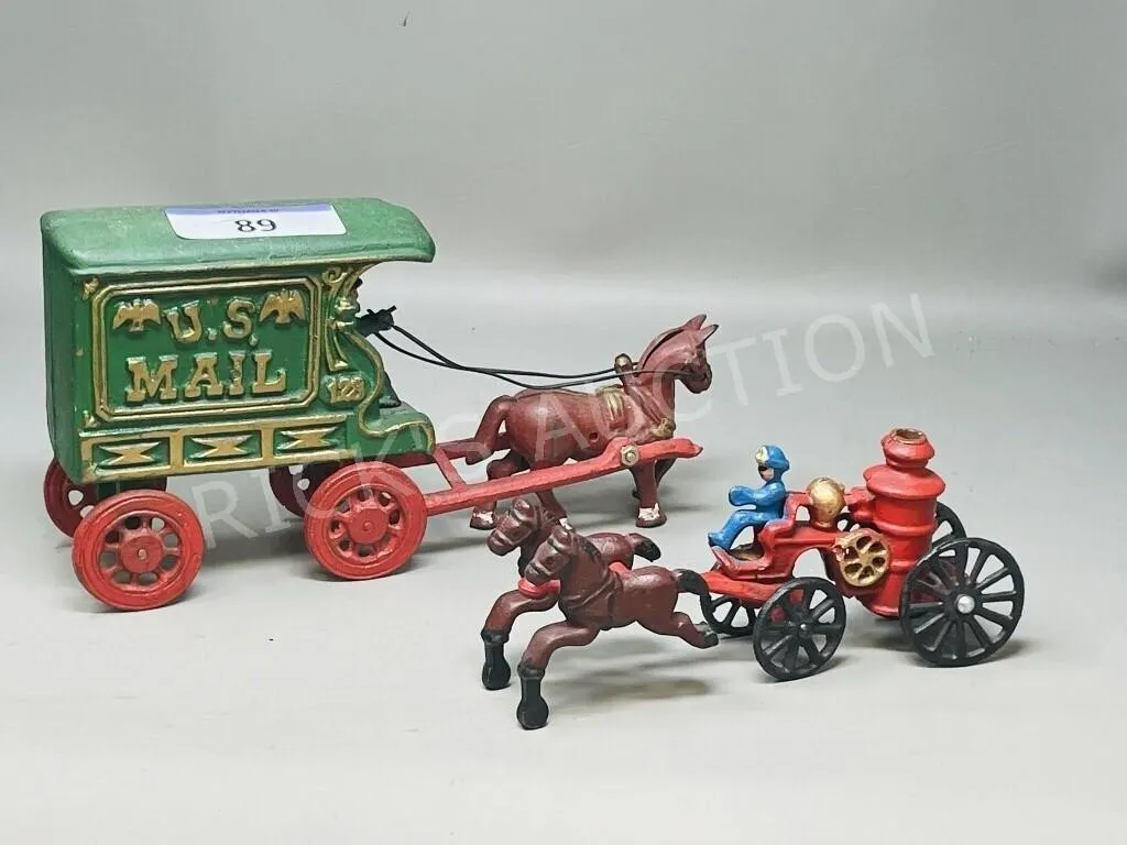 pair of cast metal horse & wagon teams