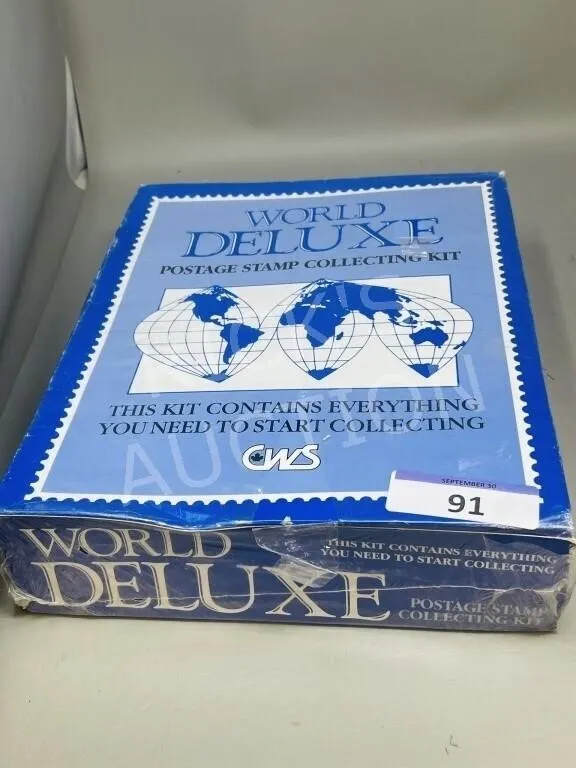 World DeLuxe postage stamp collecting kit - sealed