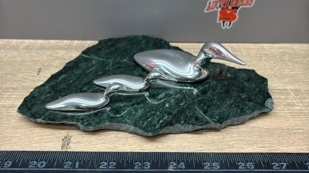 Hoselton Bird Sculpture on Marble Slab.