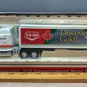 1:64 SpecCast Co-Op Peterbilt 379 Semi Coin Bank.