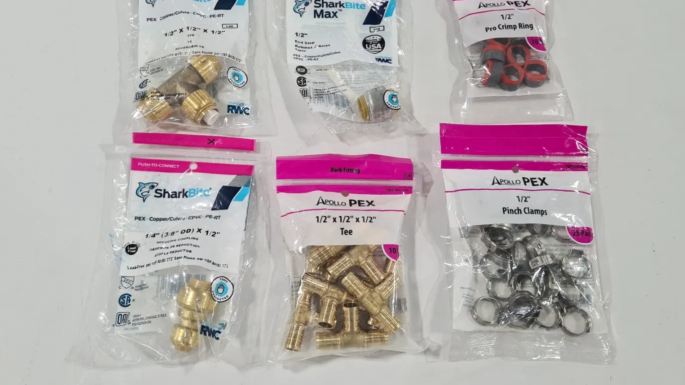 Assorted PEX Fittings and Clamps