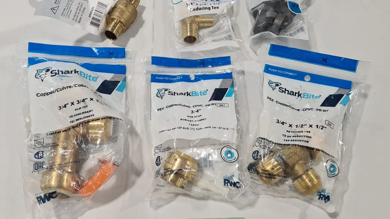 Assorted SharkBite and Apollo Plumbing Parts