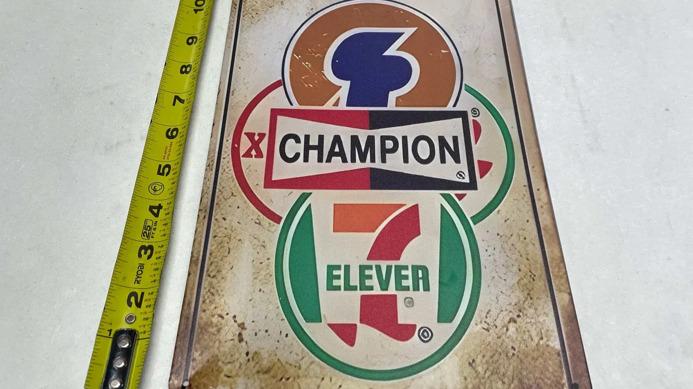 Champion and 7-Eleven Metal Sign (T-2)