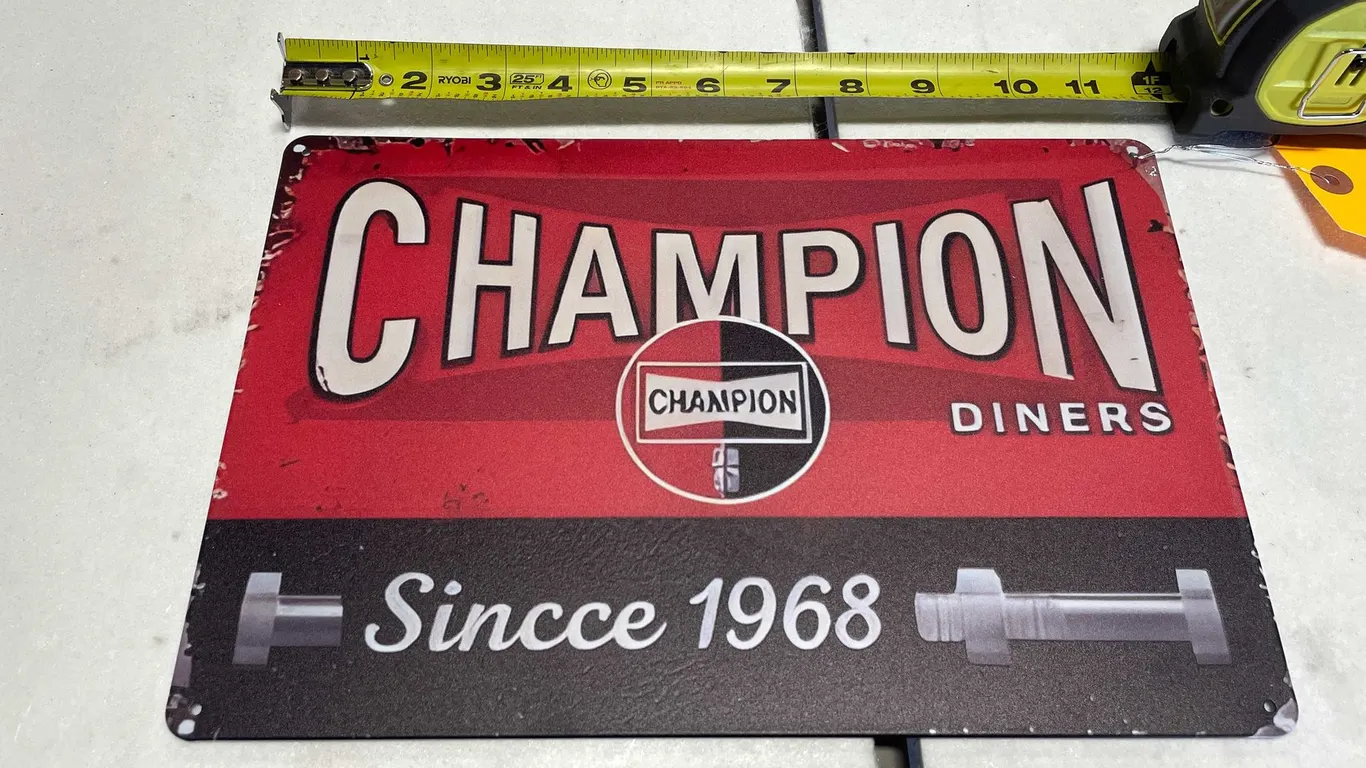 Champion Metal Sign (T-2)