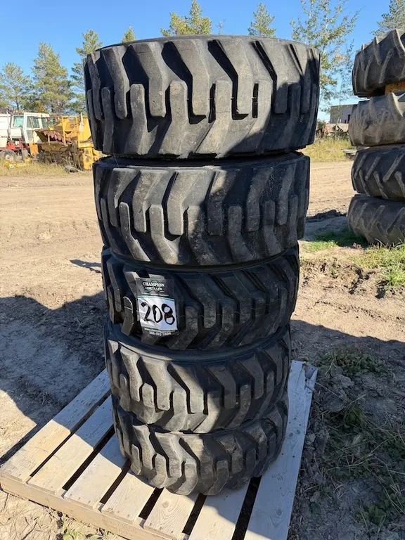 (4) Foam Filled 12 x 16.5 CAT/ Skid Steer Tires & Rims