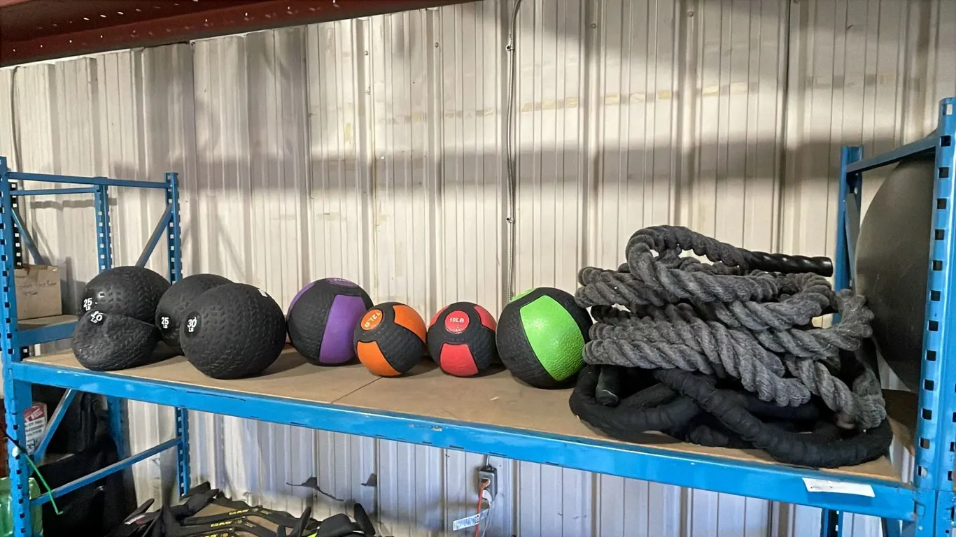 SHELF OF CONDITIONING ROPES, 2 YOGA BALLS & MEDICINE BALLS- ASSORTED WEIGHTS