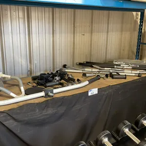 SHELF OF ASSORTED PULL DOWN HANDLES, BARS & COMMERCIAL EXERCISE ATTACHMENTS