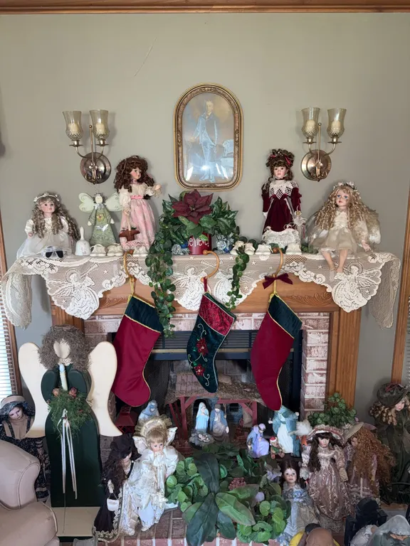 Ceramic headed Angels and nativity set on and around mantle
