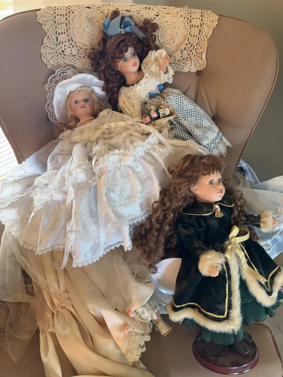 Lot of porcelain, headed dolls some on stands