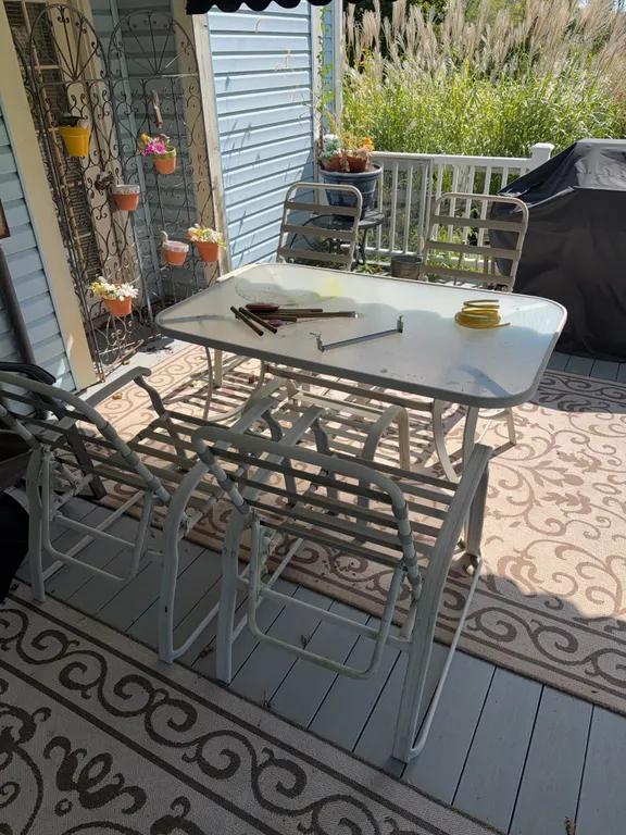 Outdoor patio table with four chairs