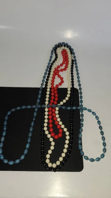 Four Colored Bead Necklaces, Black, White, Red, Blue