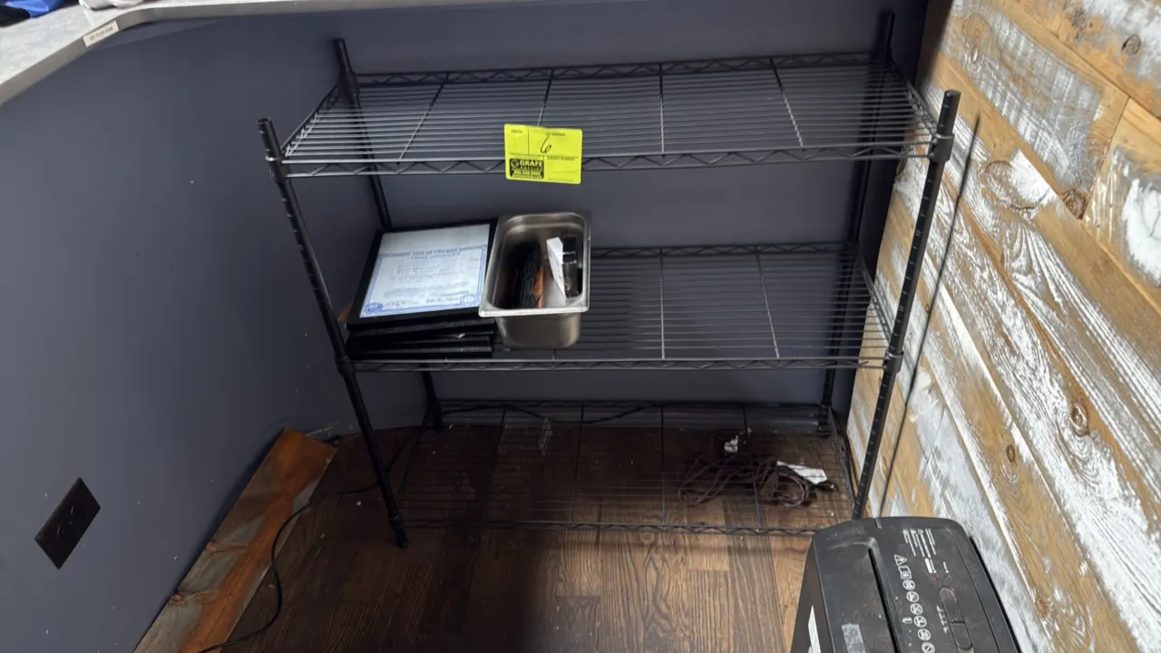 Metro-style 3-tier wire shelving rack. Features black wire construction and (3) adjustable shelves. 36" x 14" x 36". Contents not included.