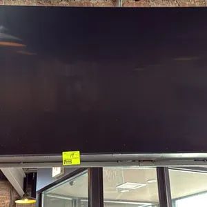 Samsung 74" flat-screen television. Wall mounted.