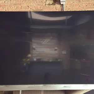 Samsung 74" flat-screen television. Wall mounted. Speaker not included.