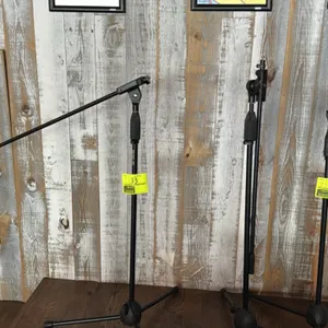 Rok-It tripod microphone boom stands. Features adjustable height with twist clutch mechanism, adjustable boom arm, and collapsible tripod base. Black 