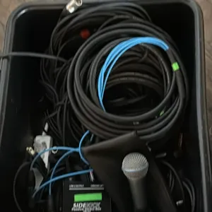 Audio equipment package including Shure SM58 microphone with clip and zippered pouch, Hosa DIB-443 Sidekick passive direct box, and assorted XLR micro
