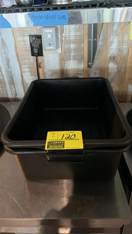 Poly bus tubs. Features brown polyethylene construction with integrated side handles and stackable design.